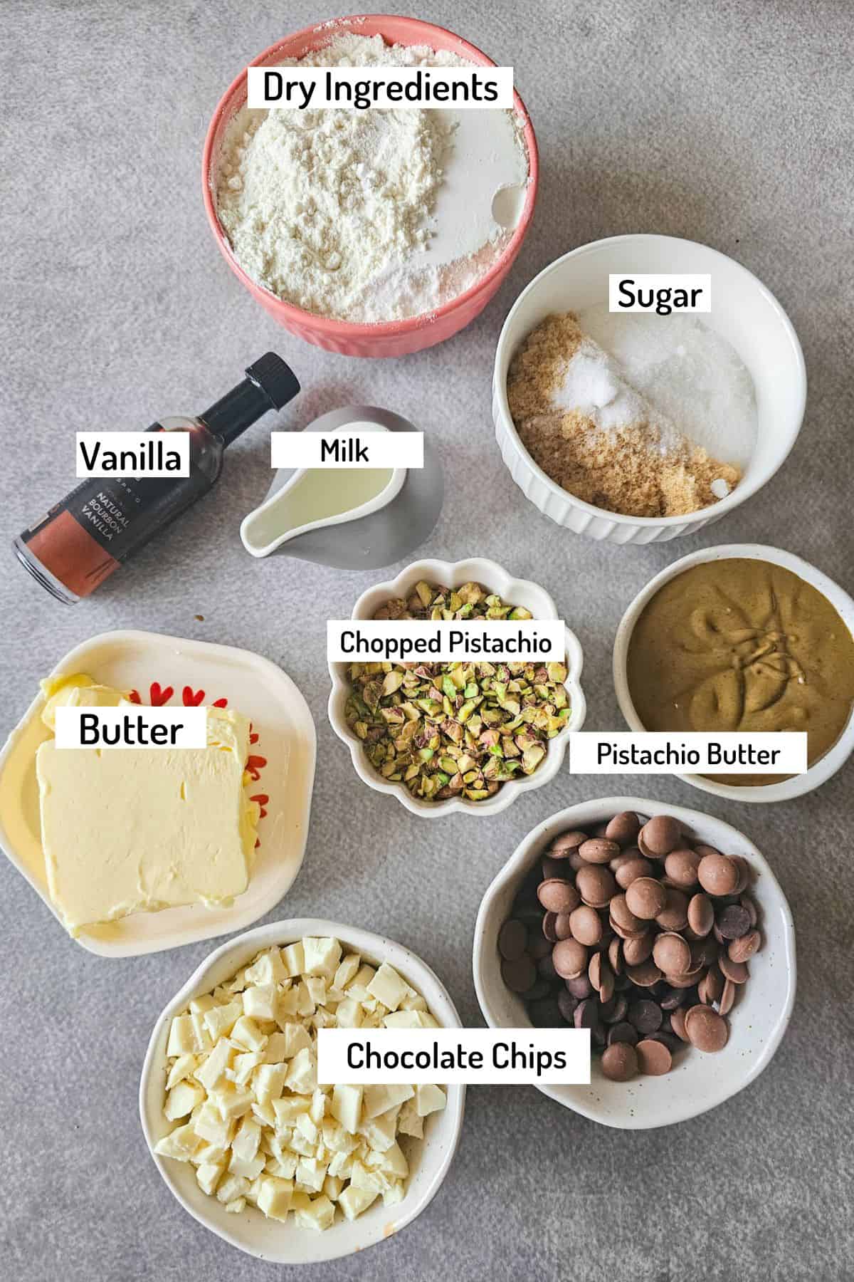 ingredients needed to make pistachio stuffed cookies laid on table top