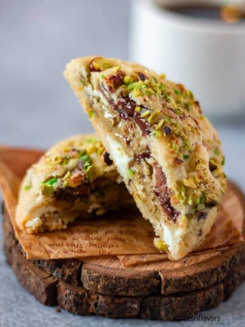 sliced pistachio stuffed cookies placed on a coaster