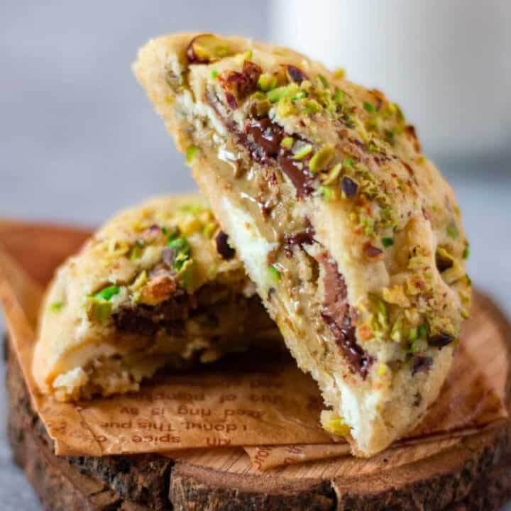 sliced pistachio stuffed cookies placed on a coaster