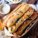 close up image of garlic breadsticks for recipe card